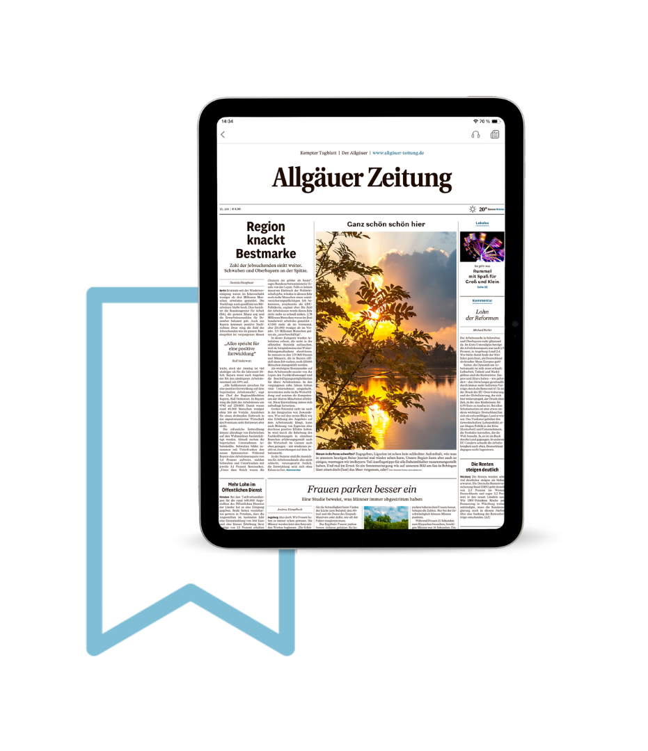 iPad mit geöffneter Nachrichten-App "Allgäuer Zeitung" und Artikelübersicht mit Bergfoto und Bild. Ein Merksymbol befindet sich im Hintergrund.